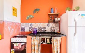 chalé com cozinha vista mar fartura